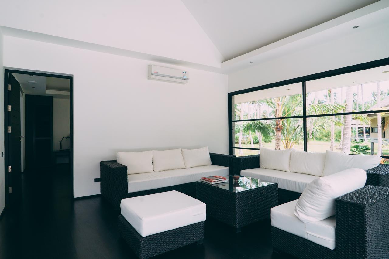 Le Motu Hotel Taling Ngam Beach Buitenkant foto