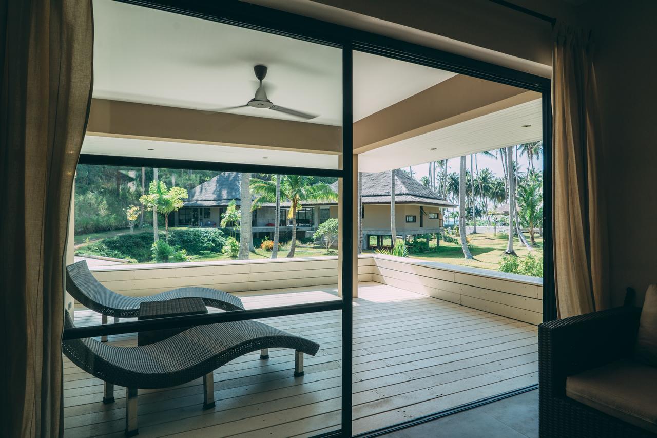 Le Motu Hotel Taling Ngam Beach Buitenkant foto