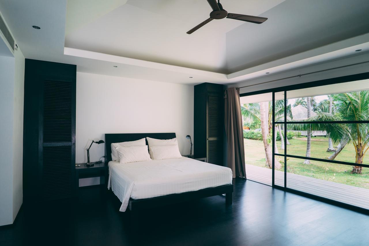 Le Motu Hotel Taling Ngam Beach Buitenkant foto